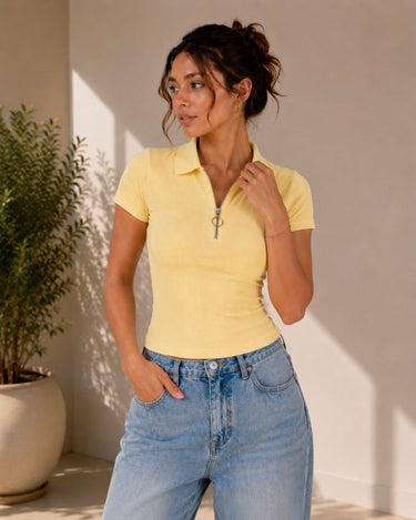 Butter yellow zip polo ribbed top for women - Fasciners Pakistan