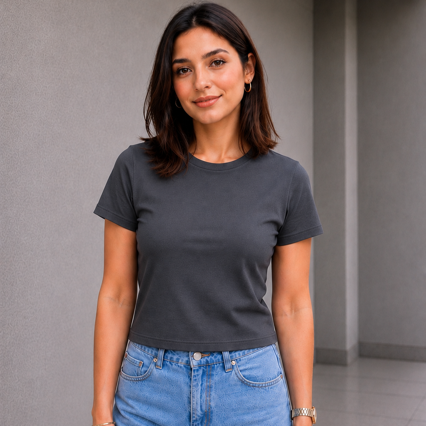 Woman wearing gray fitted crewneck t-shirt with wide-leg jeans — Fasciners Pakistan